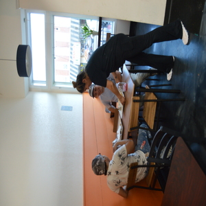 Smiling waitress serving guests at El Fogón Veracruzano.