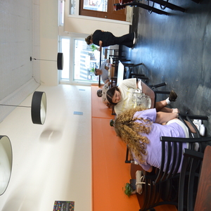 Customers enjoying their meal in a cozy and friendly atmosphere.