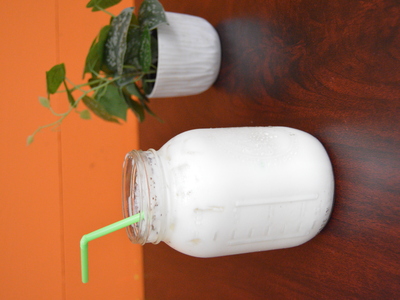 Creamy horchata with a green straw